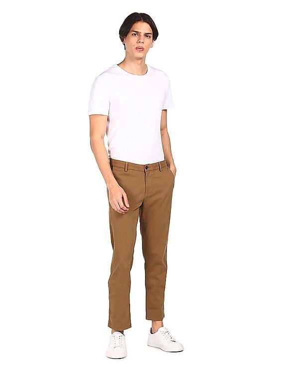 Buy Arrow Sports Mid Rise Solid Casual Trousers - NNNOW.com