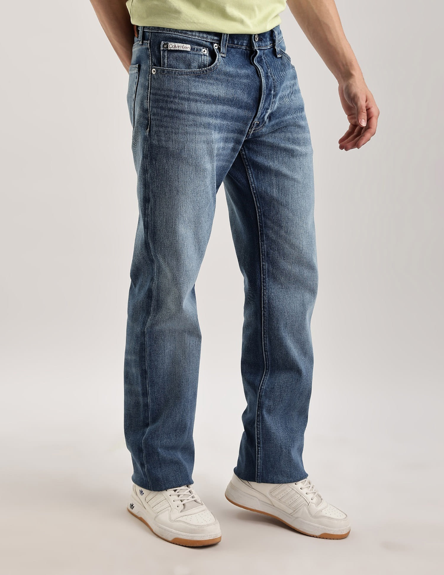 Buy Calvin Klein Jeans Light Washed Slim Straight Fit Mid Rise