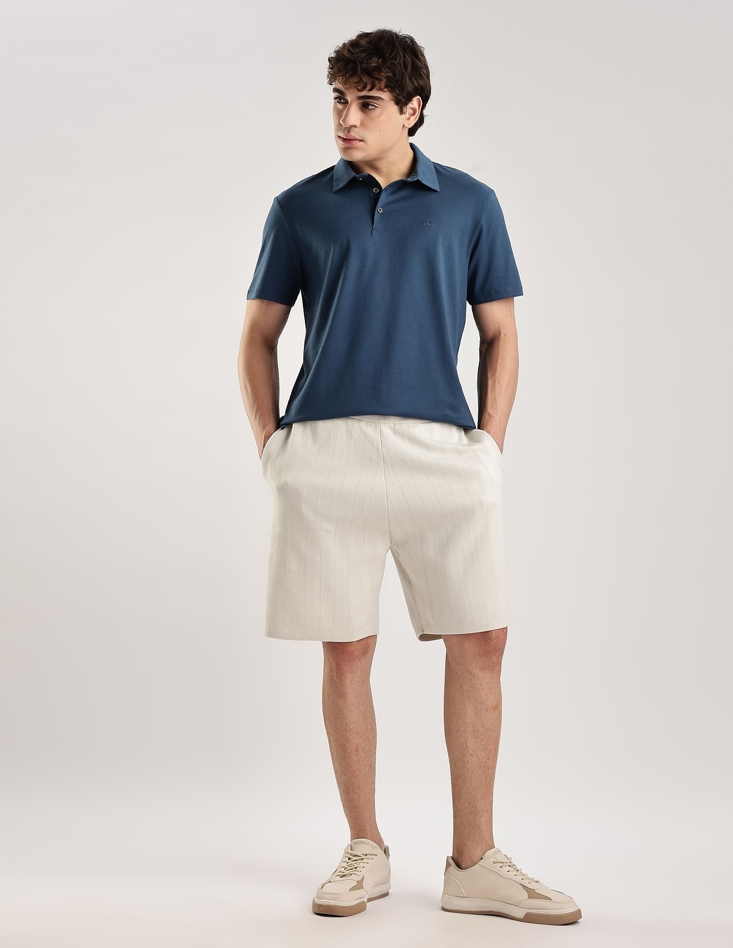 Calvin Klein Jeans Solid Regular-Fit Cotton Polo T-Shirt