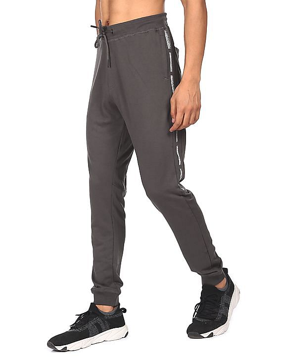 Buy FLYING MACHINE Solid Cotton Regular Fit Mens Track Pants | Shoppers Stop