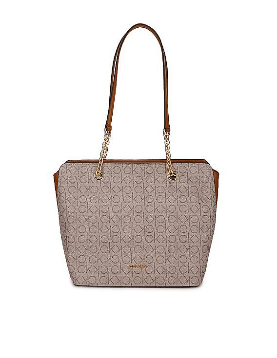 Calvin Klein Gabrianna Novelty Bucket Shoulder Bag, Almond/Taupe Mutli:  Handbags: Amazon.com
