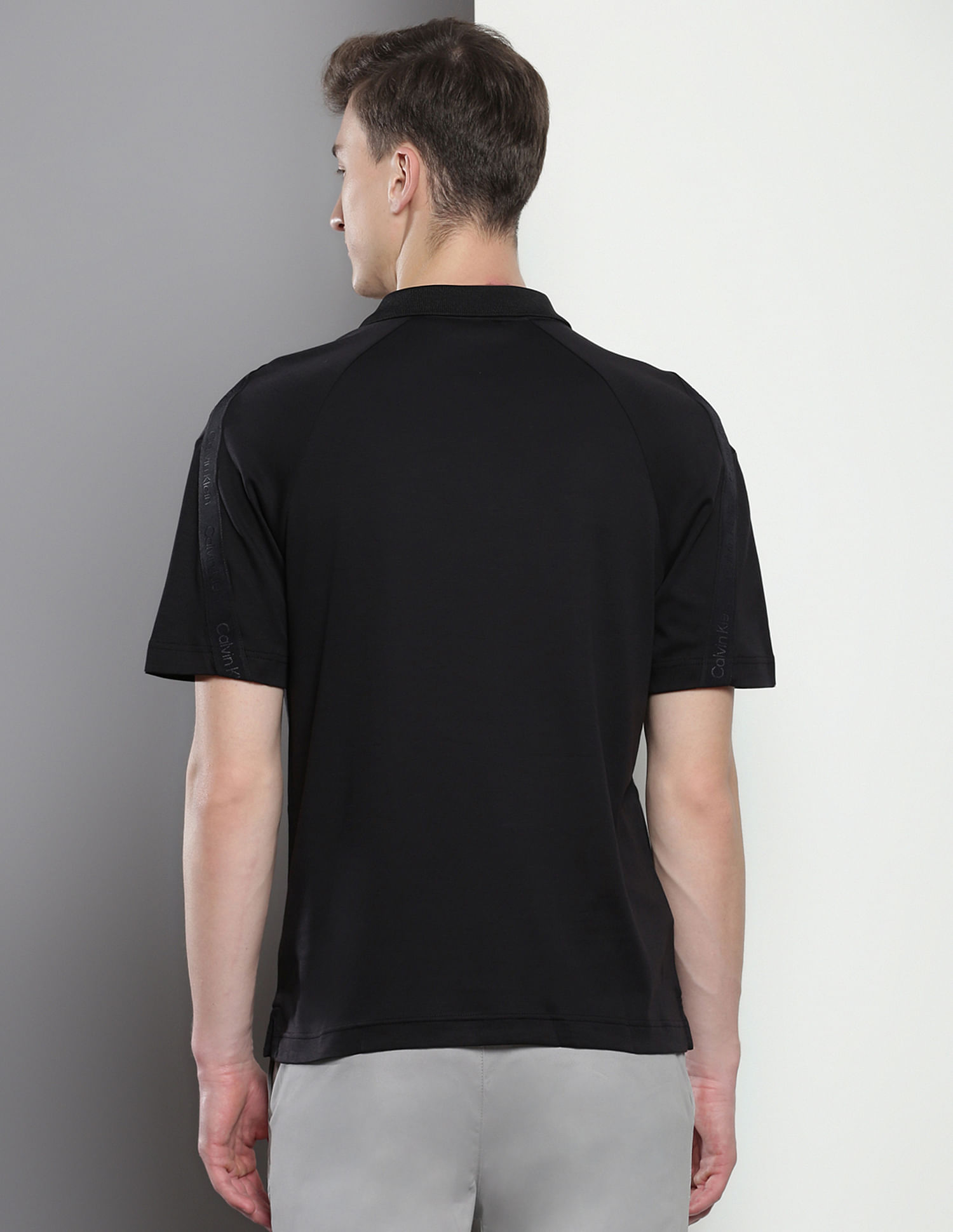 Calvin Klein Tonal Debossed Logo Polo Shirt