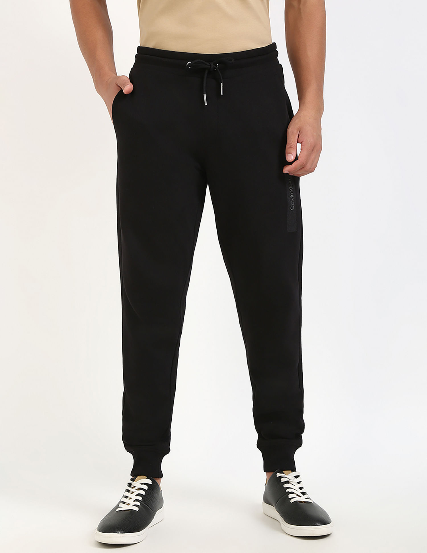 Calvin Klein Jeans Regular-Fit Solid Mid Rise Trouser