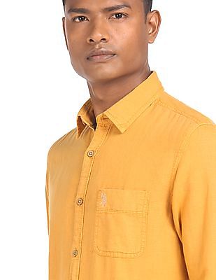 mustard yellow collared shirt
