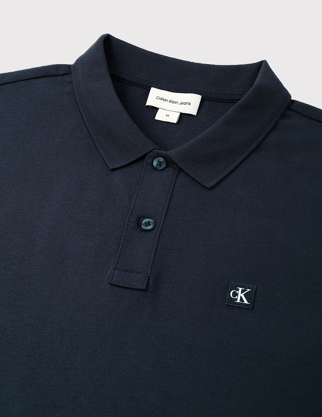 [ JEANS] Crop Badge Polo Shirt ★人気★ Buy Calvin Klein Jeans Embro Badge Reg Polo Shirt - NNNOW.com