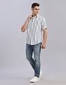 Tommy Hilfiger Mid-Wash Slim-Fit Mid Rise Jeans