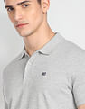 Arrow Sports Ribbed Cuff Heathered Polo Shirt