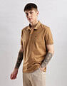 Calvin Klein Jeans Mens Brown Solid Polo Shirts