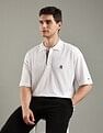 Tommy Hilfiger Solid Regular-Fit Cotton Polo Shirt