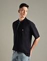 Tommy Hilfiger Solid Regular-Fit Cotton Polo Shirt