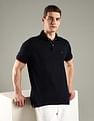 Tommy Hilfiger Solid Regular Fit Cotton Polo T-Shirt